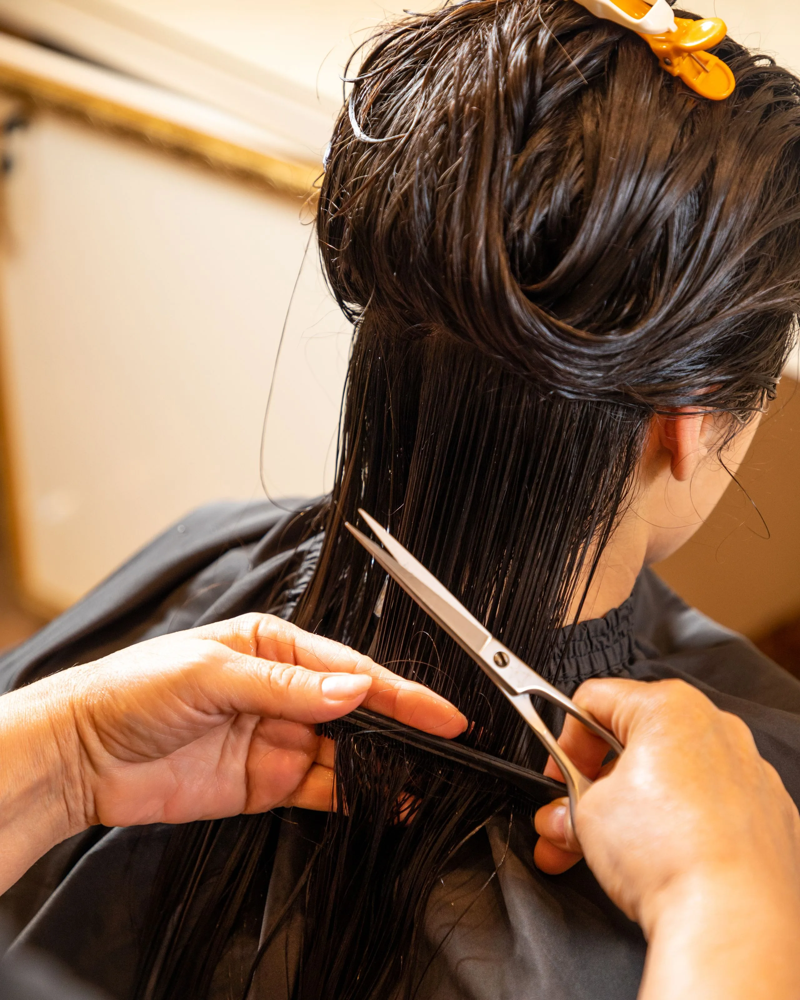 Stylist cutting hair at Nexx Faze Salon in Bluffton